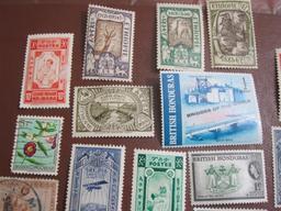 Mixed lot of more than TWO DOZEN foreign postage stamps from Ethiopia, British Honduras and Belgian