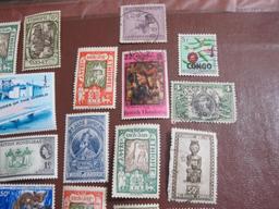 Mixed lot of more than TWO DOZEN foreign postage stamps from Ethiopia, British Honduras and Belgian