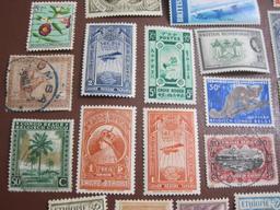 Mixed lot of more than TWO DOZEN foreign postage stamps from Ethiopia, British Honduras and Belgian