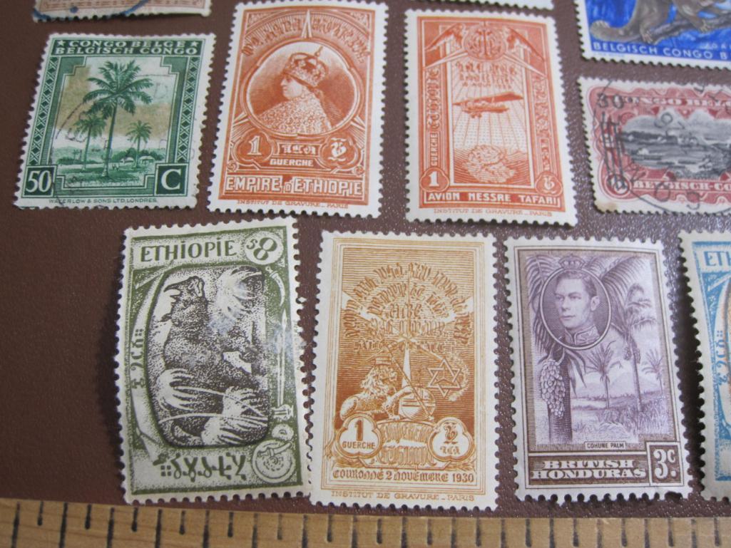 Mixed lot of more than TWO DOZEN foreign postage stamps from Ethiopia, British Honduras and Belgian