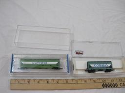 Two N Scale Corning Glass Works Hopper Cars, Bachmann NAHX90404 and Atlas NAHX90408, in original