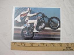 Lot of Evel Knievel Memorabilia including photo, comic book and souvenir program from 1971, 7 oz