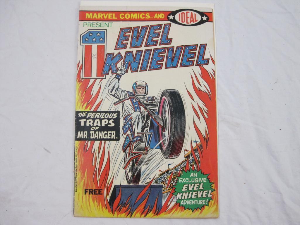 Lot of Evel Knievel Memorabilia including photo, comic book and souvenir program from 1971, 7 oz