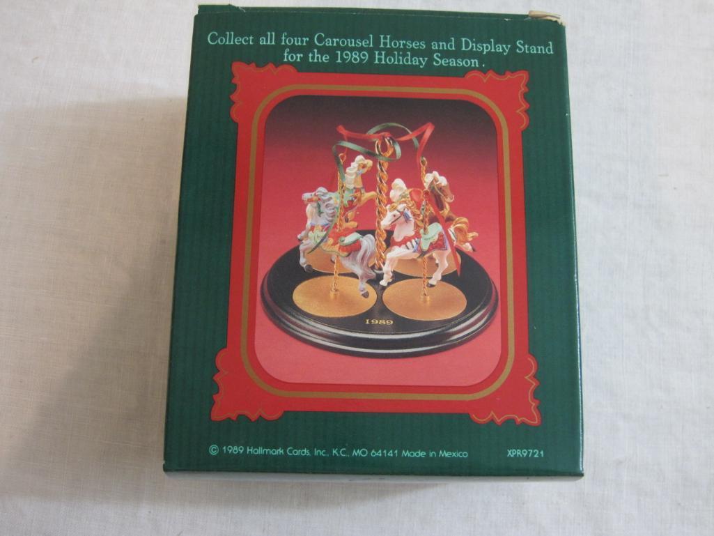 Lot of Carousel Horses Hallmark Ornaments including Snow, Holly, Star, Ginger, and 2 Display Stands,