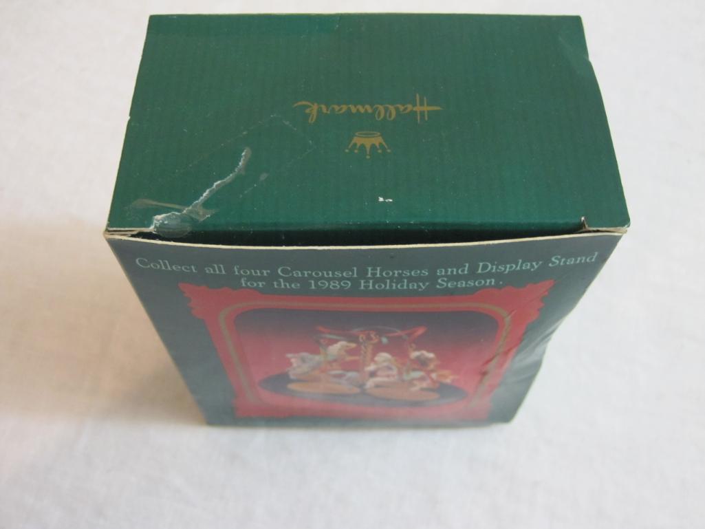 Lot of Carousel Horses Hallmark Ornaments including Snow, Holly, Star, Ginger, and 2 Display Stands,