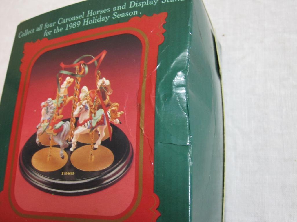Lot of Carousel Horses Hallmark Ornaments including Snow, Holly, Star, Ginger, and 2 Display Stands,