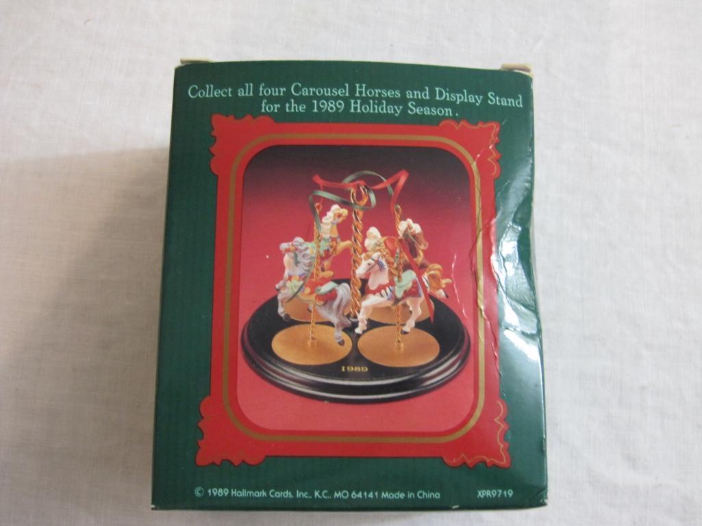 Lot of Carousel Horses Hallmark Ornaments including Snow, Holly, Star, Ginger, and 2 Display Stands,