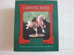 Lot of Carousel Horses Hallmark Ornaments including Snow, Holly, Star, Ginger, and 2 Display Stands,