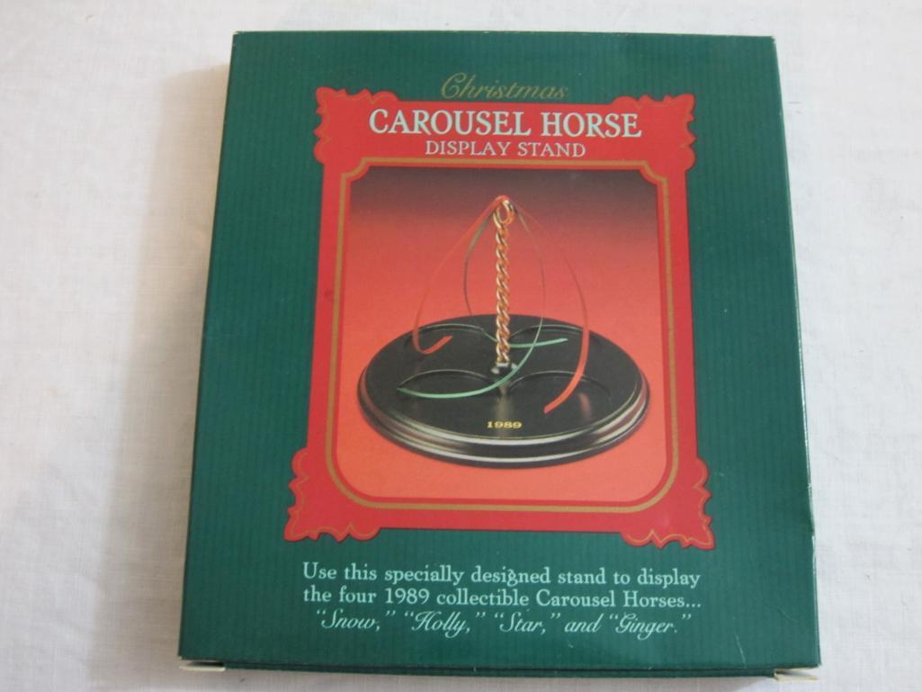 Lot of Carousel Horses Hallmark Ornaments including Snow, Holly, Star, Ginger, and 2 Display Stands,