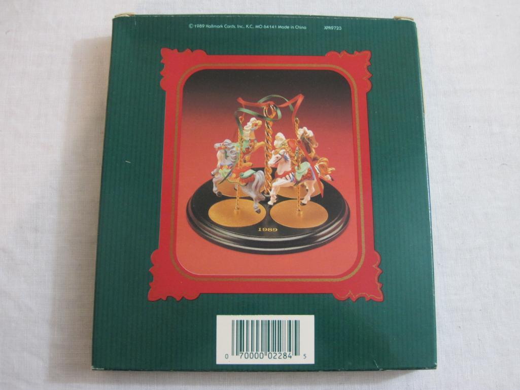 Lot of Carousel Horses Hallmark Ornaments including Snow, Holly, Star, Ginger, and 2 Display Stands,