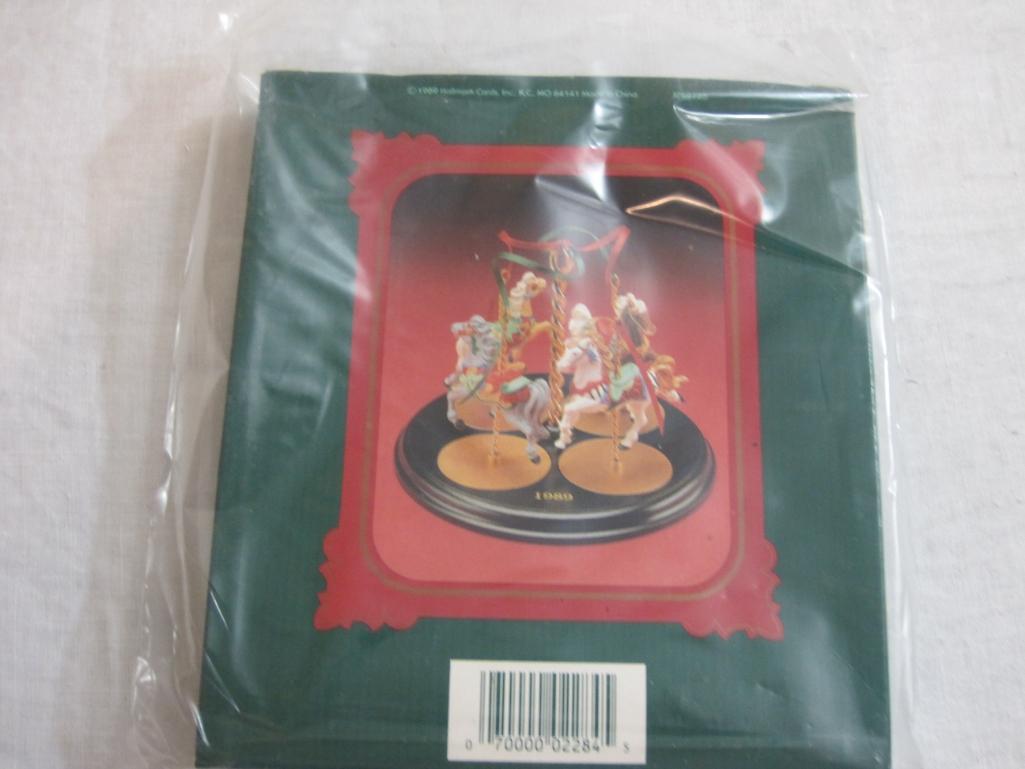Lot of Carousel Horses Hallmark Ornaments including Snow, Holly, Star, Ginger, and 2 Display Stands,