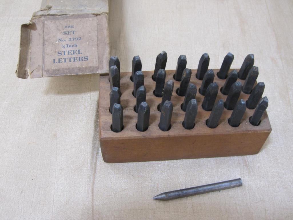 Set of Steel Punches in wooden block, No 6792 1/8 inch Letters