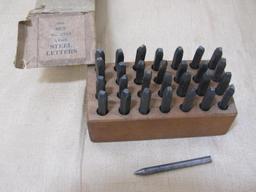 Set of Steel Punches in wooden block, No 6792 1/8 inch Letters