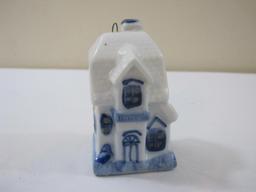 Two Miniature Houses including ceramic ornament and resin B Cummings Signmaker house, 13 oz