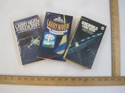 Three Larry Niven Science Fiction Books including A Hole in Space (1974), The Ring World Engineers