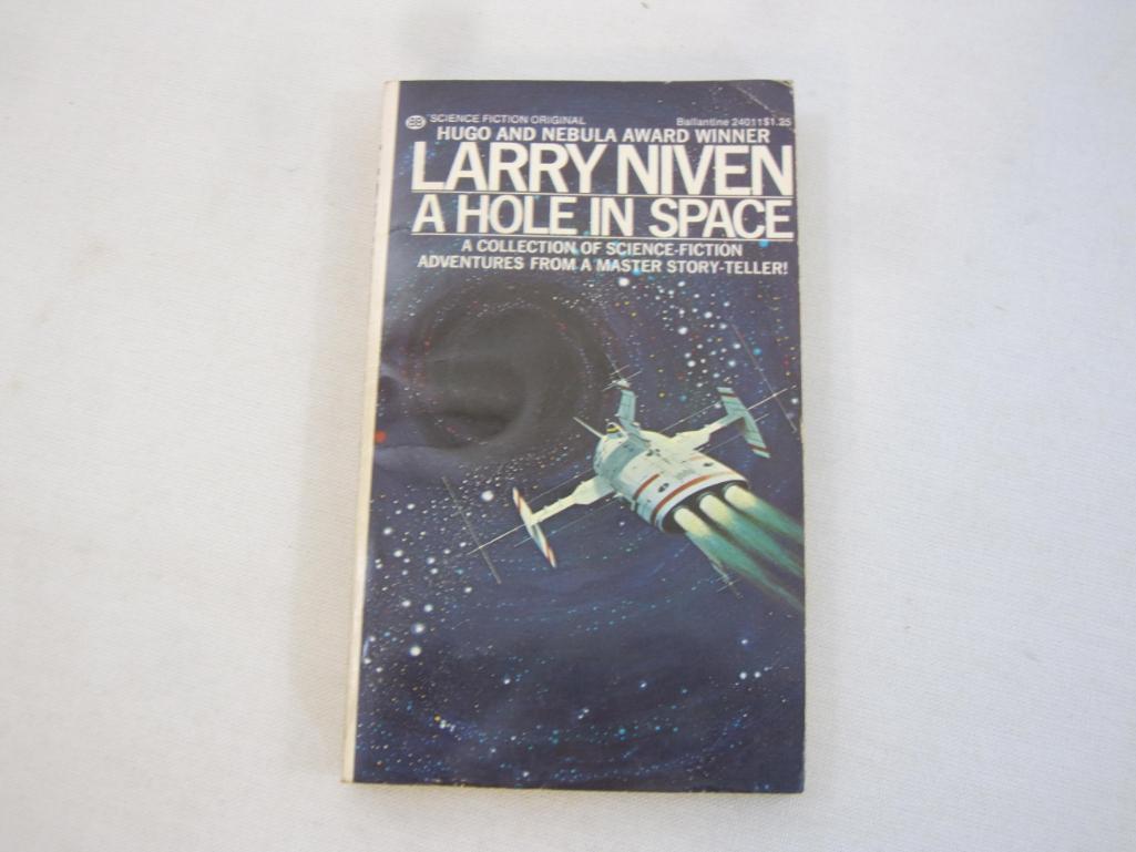 Three Larry Niven Science Fiction Books including A Hole in Space (1974), The Ring World Engineers