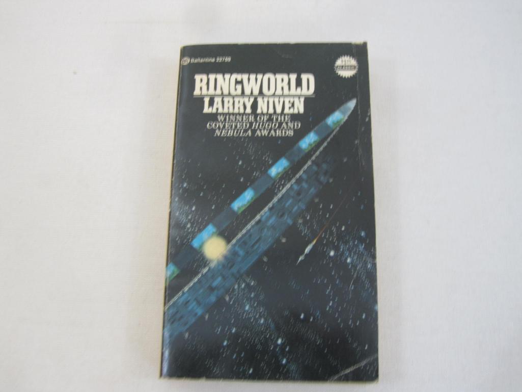 Three Larry Niven Science Fiction Books including A Hole in Space (1974), The Ring World Engineers