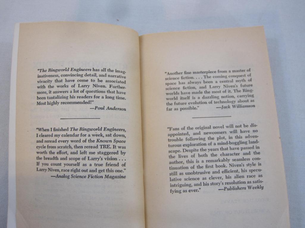 Three Larry Niven Science Fiction Books including A Hole in Space (1974), The Ring World Engineers