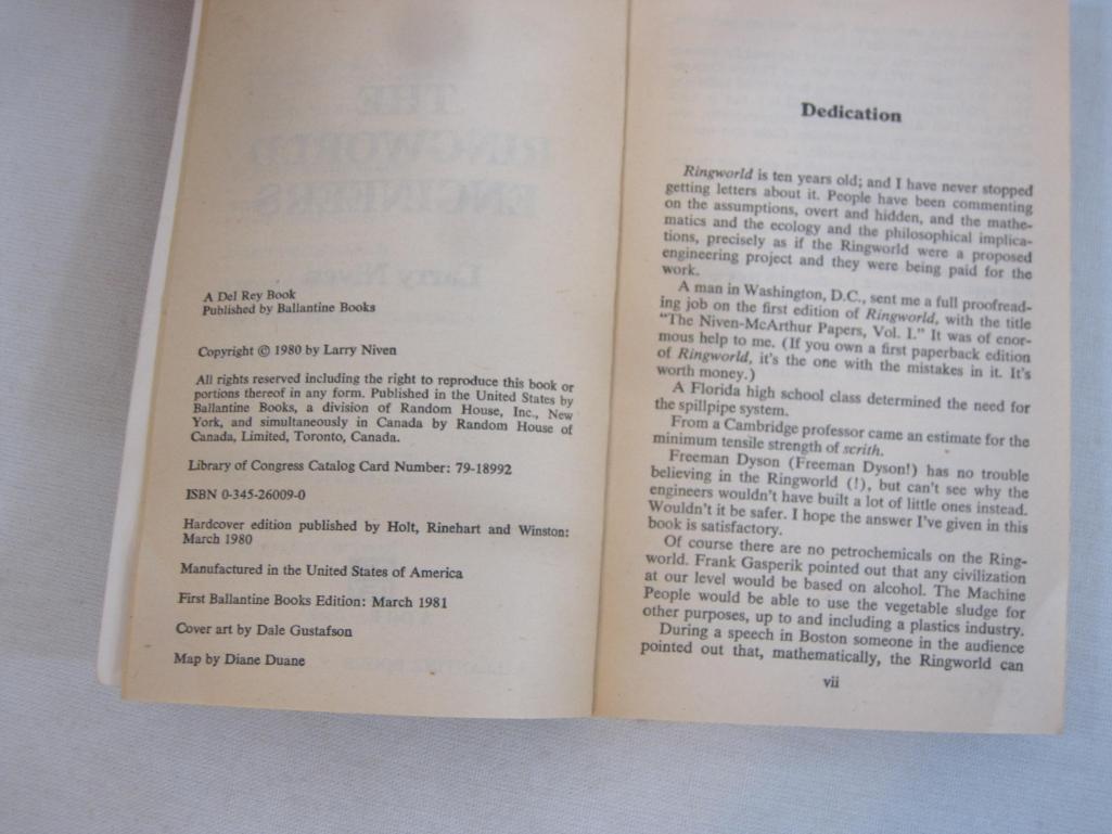 Three Larry Niven Science Fiction Books including A Hole in Space (1974), The Ring World Engineers