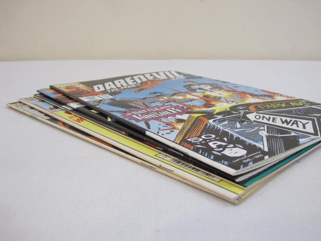 Five Daredevil Comic Books including Marvel Adventure Featuring: Daredevil No. 4 June 1976 and
