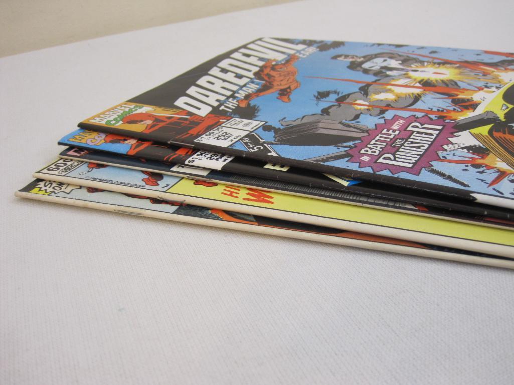 Five Daredevil Comic Books including Marvel Adventure Featuring: Daredevil No. 4 June 1976 and