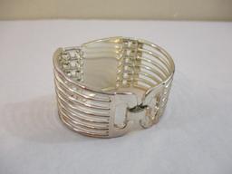 Two Silver Tone Bracelets including clamshell with rhinestones, 4 oz