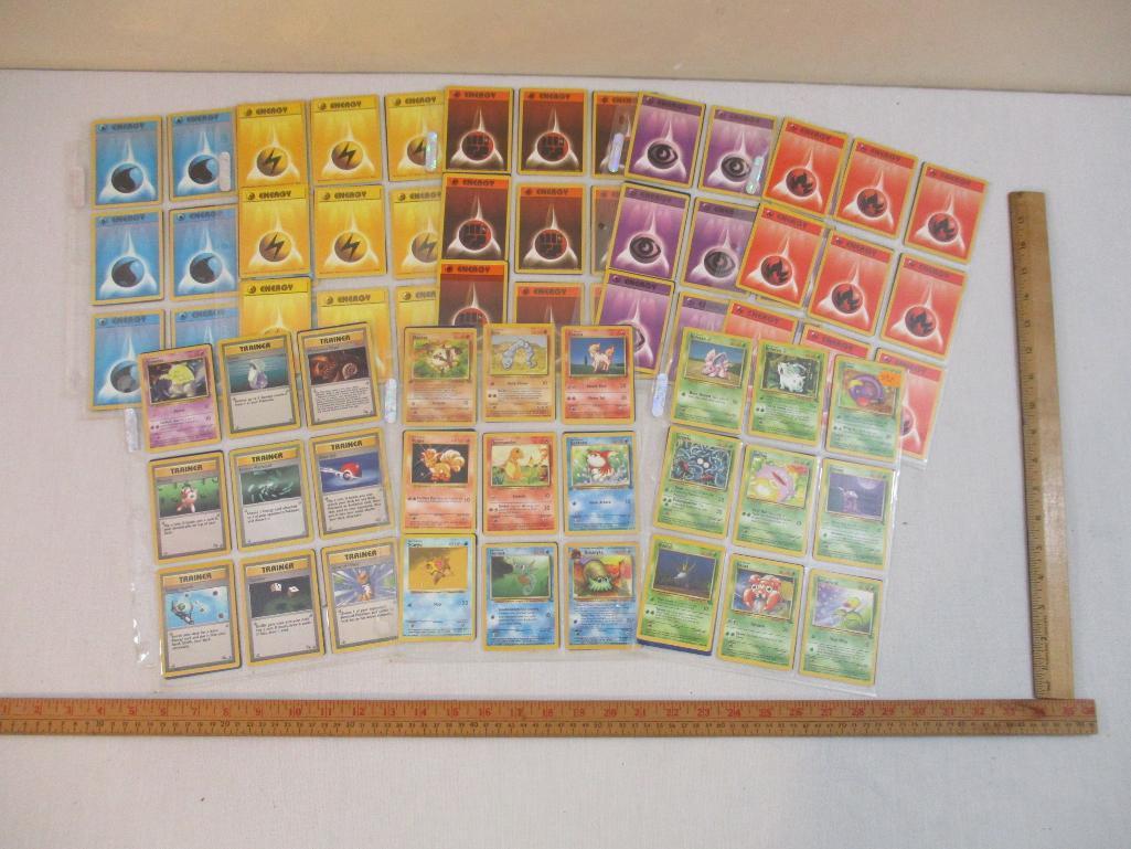 Seven Sheets of Pokemon Cards, 1999 Wizards including Paras, Grimer, Charmander, Trainers and