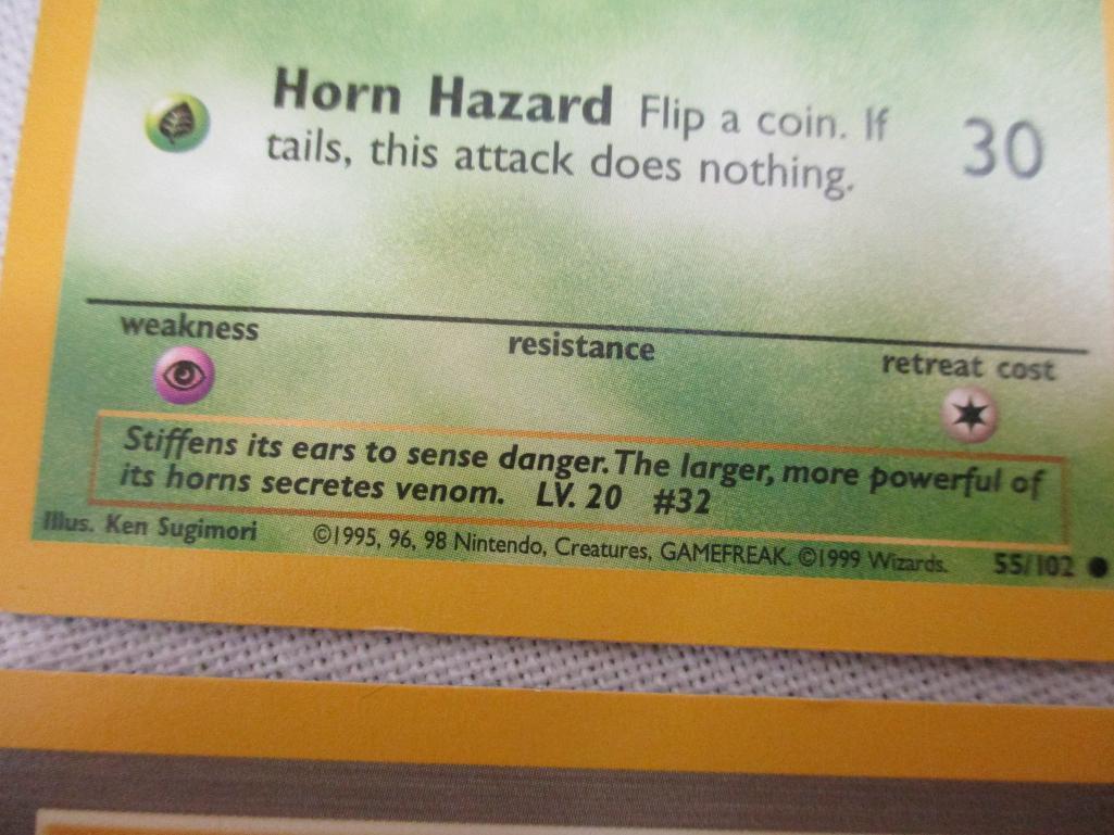 Seven Sheets of Pokemon Cards, 1999 Wizards including Paras, Grimer, Charmander, Trainers and