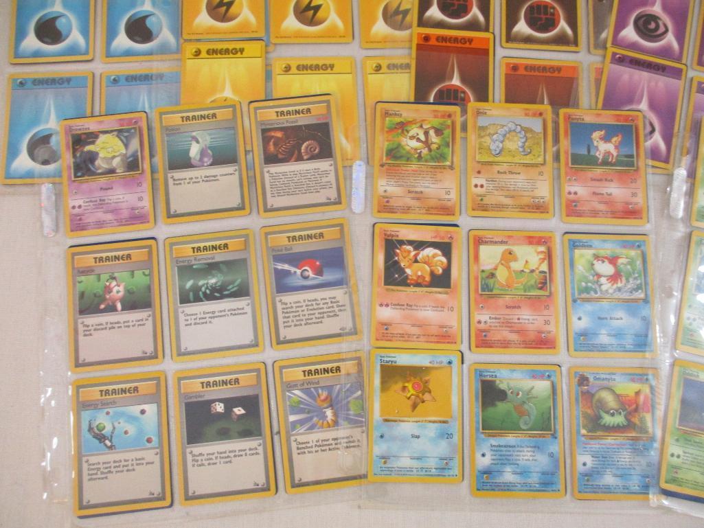 Seven Sheets of Pokemon Cards, 1999 Wizards including Paras, Grimer, Charmander, Trainers and