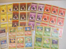 Seven Sheets of Pokemon Cards, 1999 Wizards including Paras, Grimer, Charmander, Trainers and