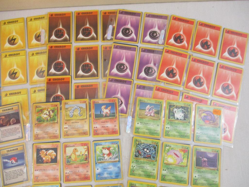 Seven Sheets of Pokemon Cards, 1999 Wizards including Paras, Grimer, Charmander, Trainers and