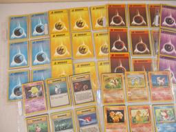Seven Sheets of Pokemon Cards, 1999 Wizards including Paras, Grimer, Charmander, Trainers and