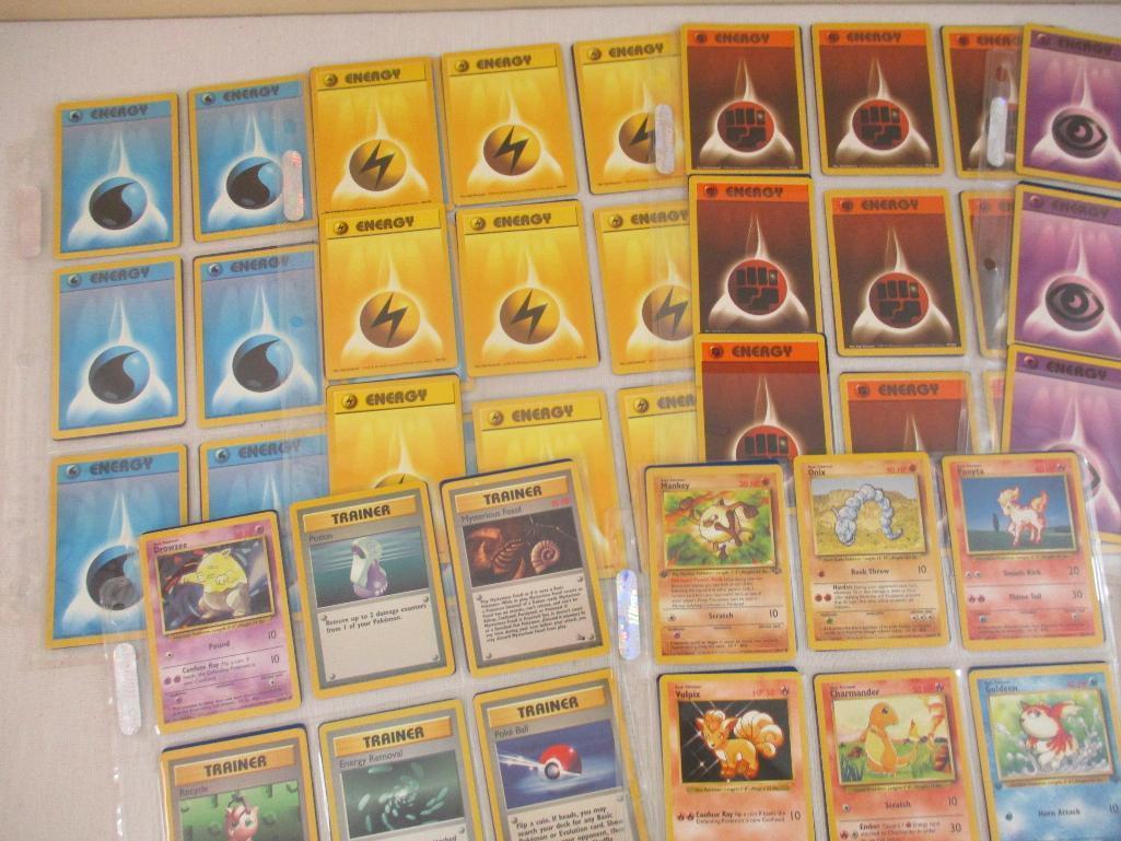 Seven Sheets of Pokemon Cards, 1999 Wizards including Paras, Grimer, Charmander, Trainers and