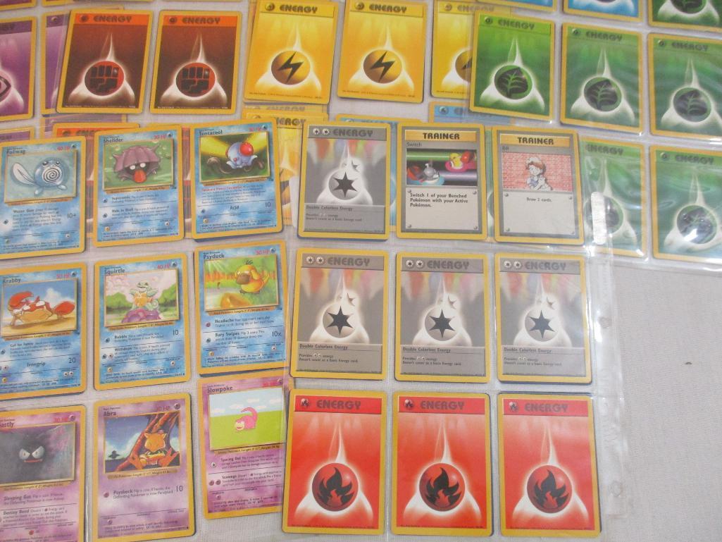 Seven Sheets of Pokemon Cards, 1999 Wizards including Paras, Grimer, Charmander, Trainers and