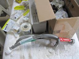 Assorted Plumbing Parts in Plastic Tub with Lid, Sterling Pop-up Drain, and more