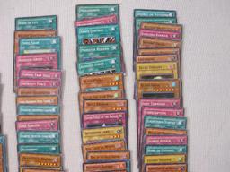Assorted Yu-Gi-Oh Trading Cards including foil The Wicked Dreadroot, foil Treasure Map, foil