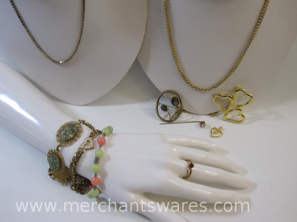 Assorted Gold Tone Costume Jewelry including heart and flower pins, solid copper and stone bracelet