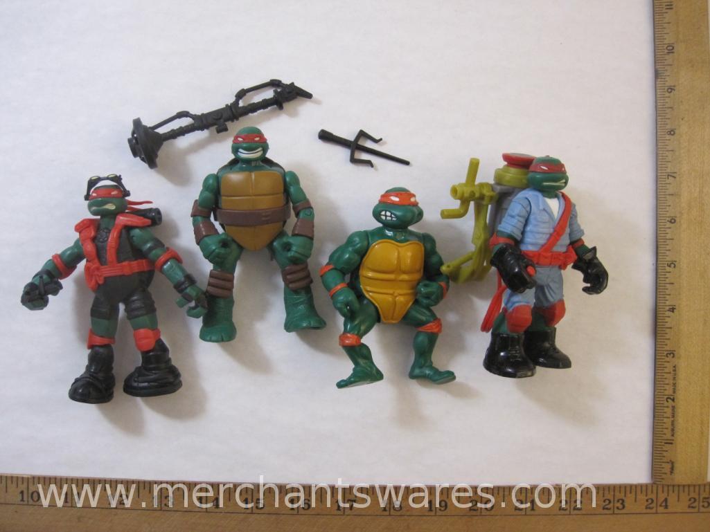 Four Teenage Mutant Ninja Turtles including 2013 Stealth Tech Raphael, 2012 Hand to Hand Ooze