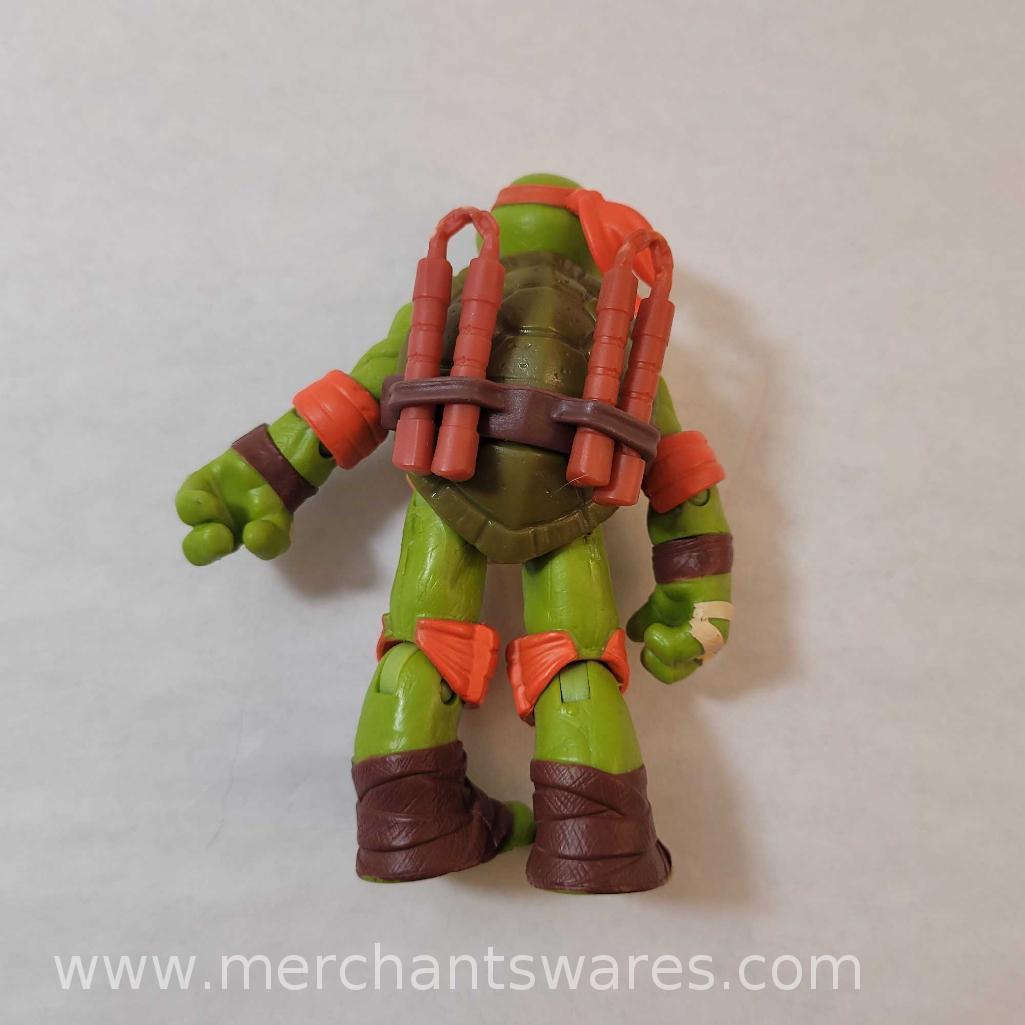 Four Michelangelo Teenage Mutant Ninja Turtles Figures including 2014 Mutations Michelangelo, 2015