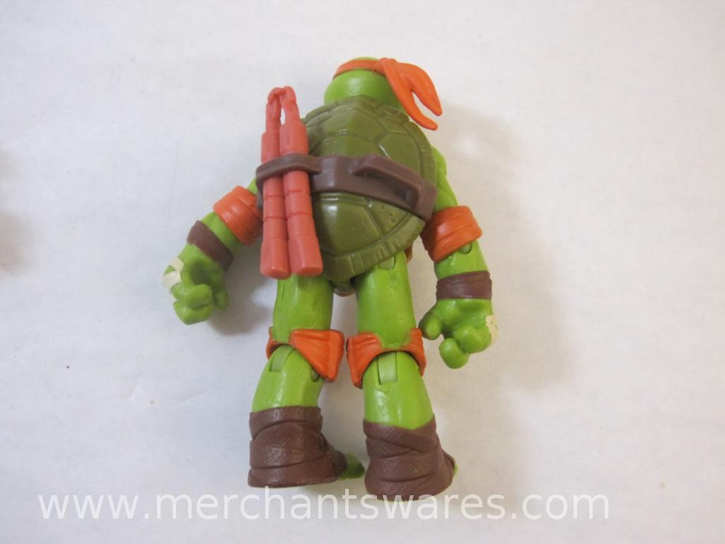 Four Michelangelo Teenage Mutant Ninja Turtles Action Figures including 2015 Mutations Aerial Attack