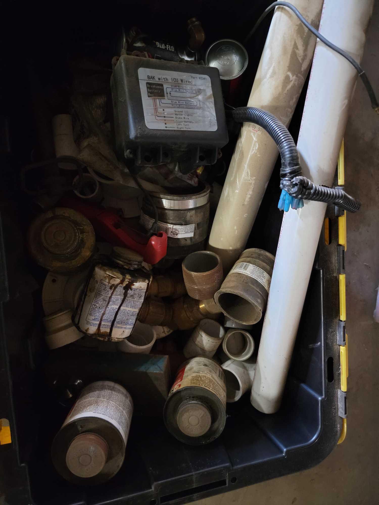 CONTAINER CONTAINING PCV PLUMBING PARTS
