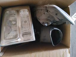 BOX CONSISTING OF HEADLIGHTS AND AIR CLEANER PARTS