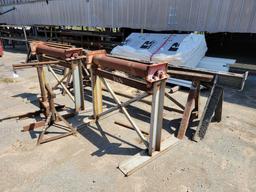 4 - IRON ROLLERS AND 2 - SAW HORSES