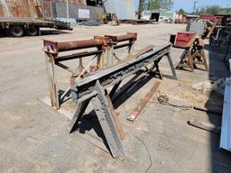 4 - IRON ROLLERS AND 2 - SAW HORSES