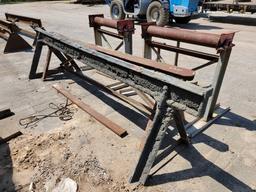 4 - IRON ROLLERS AND 2 - SAW HORSES