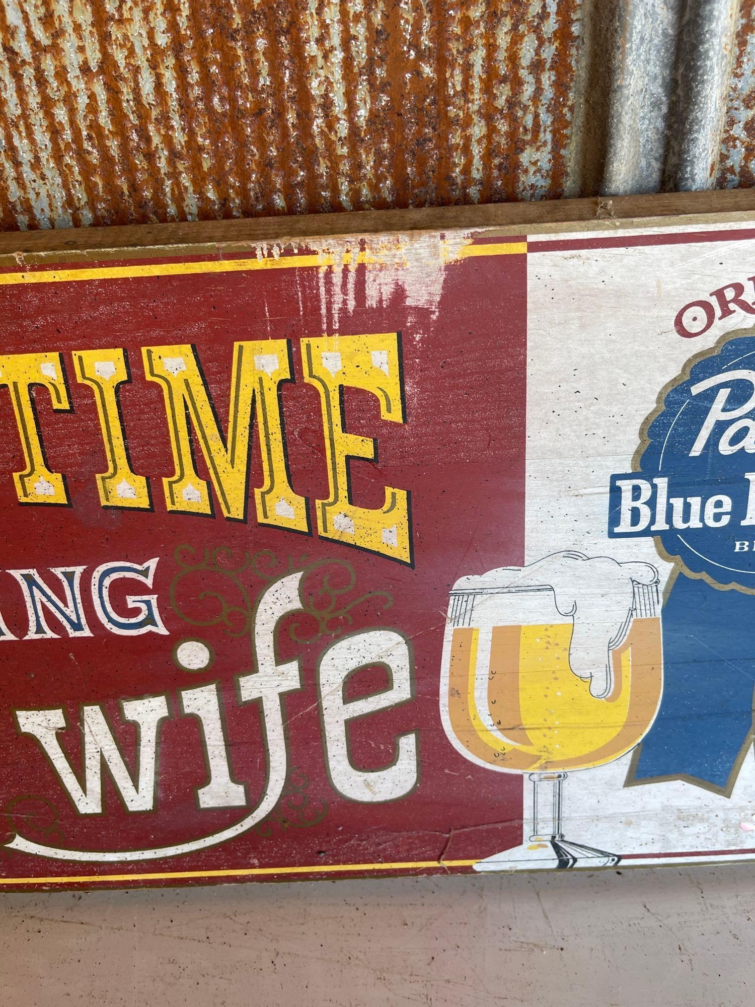 "NEXT TIME BRING YOUR WIFE" SIGN