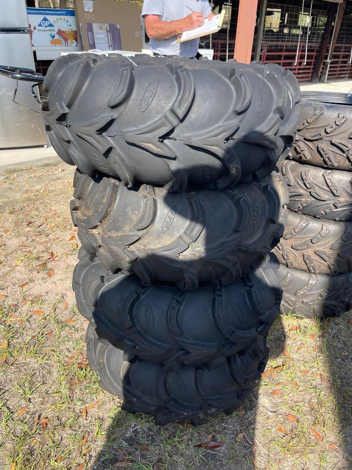 2104 - 4- ITP MUD LITE TIRES & RIMS