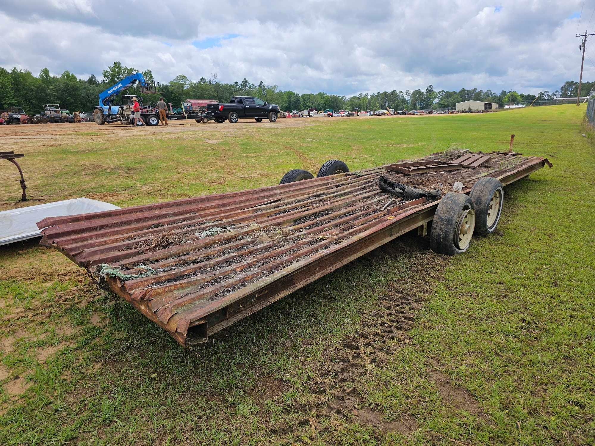 2904 - 66" X 25' DUAL AXLE HOME MADE TRAILER