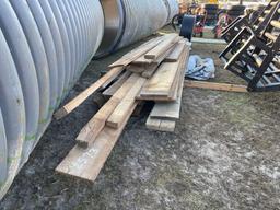 2573 - PILE OF OLD LUMBER