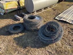 2580 - 15- LARGE 1- SMALL ROLLS OF BABRED WIRE